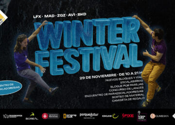Dos personas escalando en un muro de escalada con el texto "Winter Festival" en grand